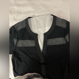 Black long sleeve soft top by Karen Millen. Netting at top